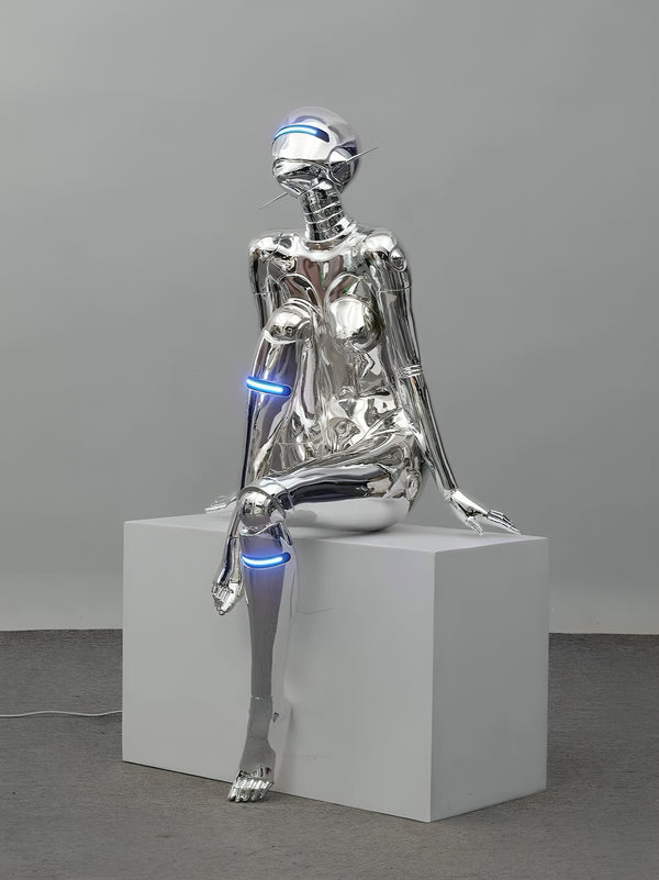 Futuristic Abstract Humanoid Robot with Light Visor Sitting Down Statue - Silver