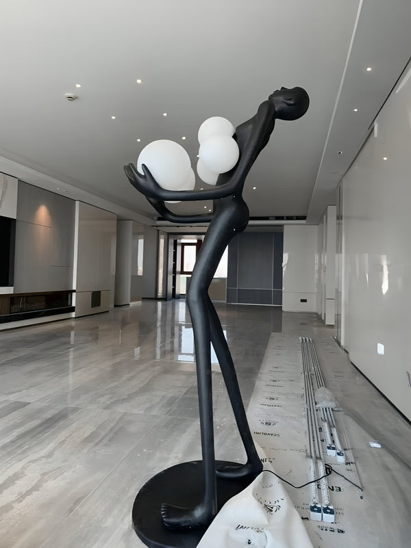 Abstract Human Holding Lights Emotional Looking Up Lamp Floor Statue - Black