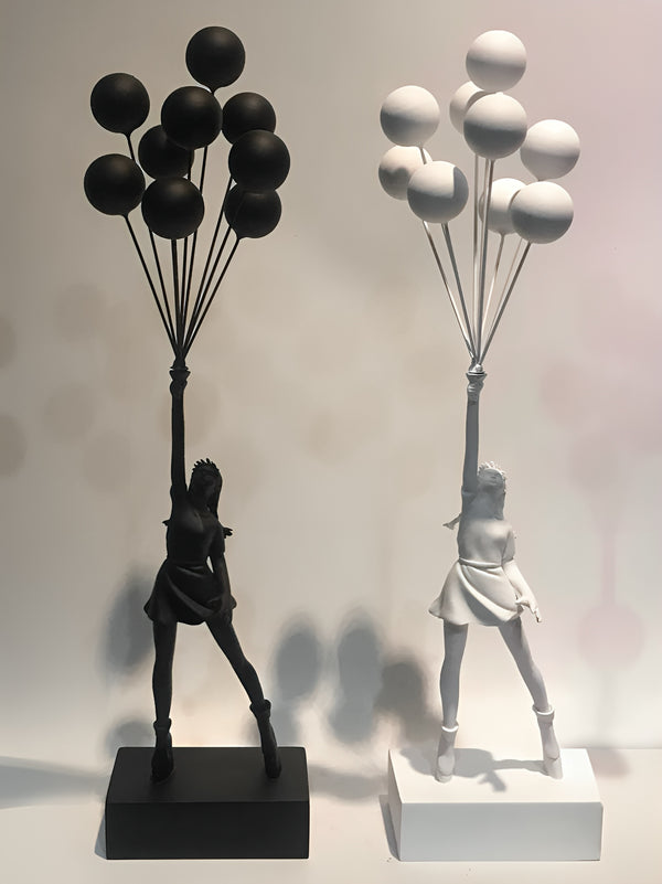 Pair of Woman Holding Up Multiple Balloons into Air Figurine - White & Black