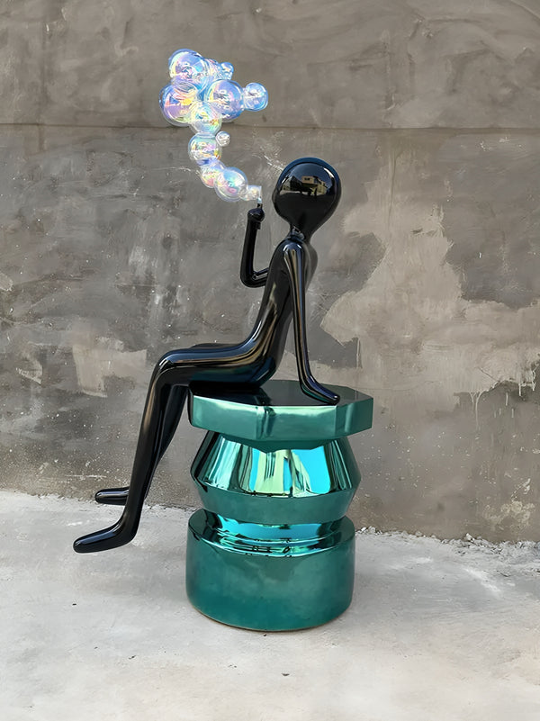 Abstract Character Sitting Blowing Bubbles Statue - Black / Fluo Clear