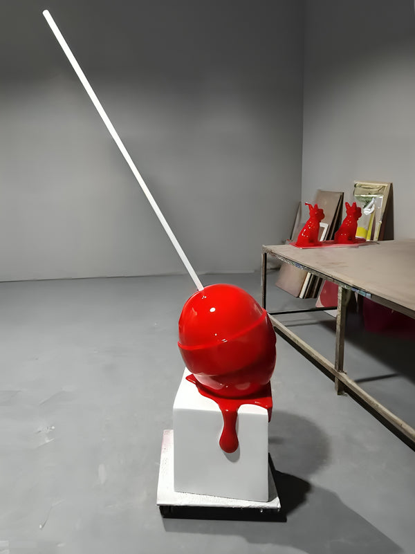 Melting Lollipop Sitting on Edge Statue - Red