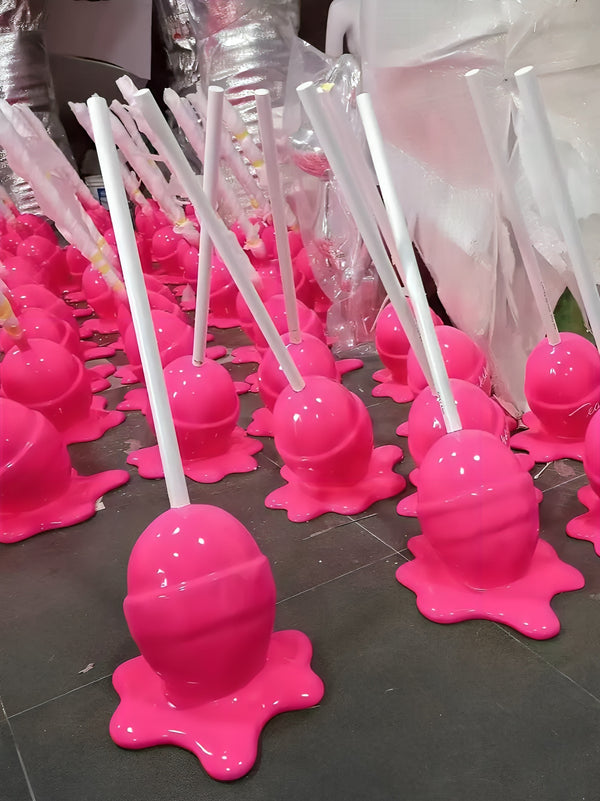 Melting Lollipop Sitting on Edge Statue - Fluo Pink